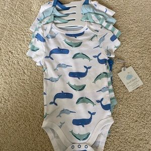 4 pack of 6-9 month onesies. New with tags. 🐳🐟🐬